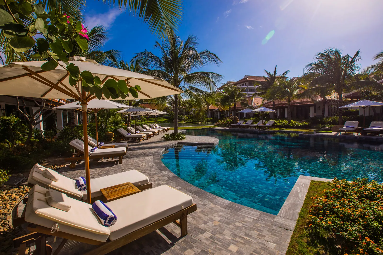 Loungers beside the pool at The Anam resort, Nguyen Tat Thanh, Cam Hai Dong, Cam Lam, Khanh Hoa, the Bai Dai resort strip.